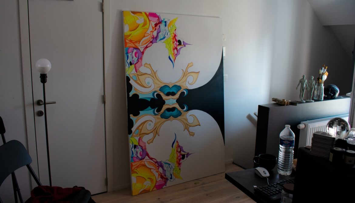 A colorful painting stands in a room.